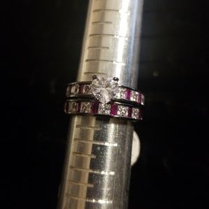 Black and pink heart ring.